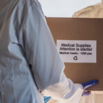 Delivery,Of,A,Box,With,Medical,Masks,To,The,Hospital