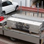 Small,Trailer,Transporting,Construction,Material,For,Building,A,New,House